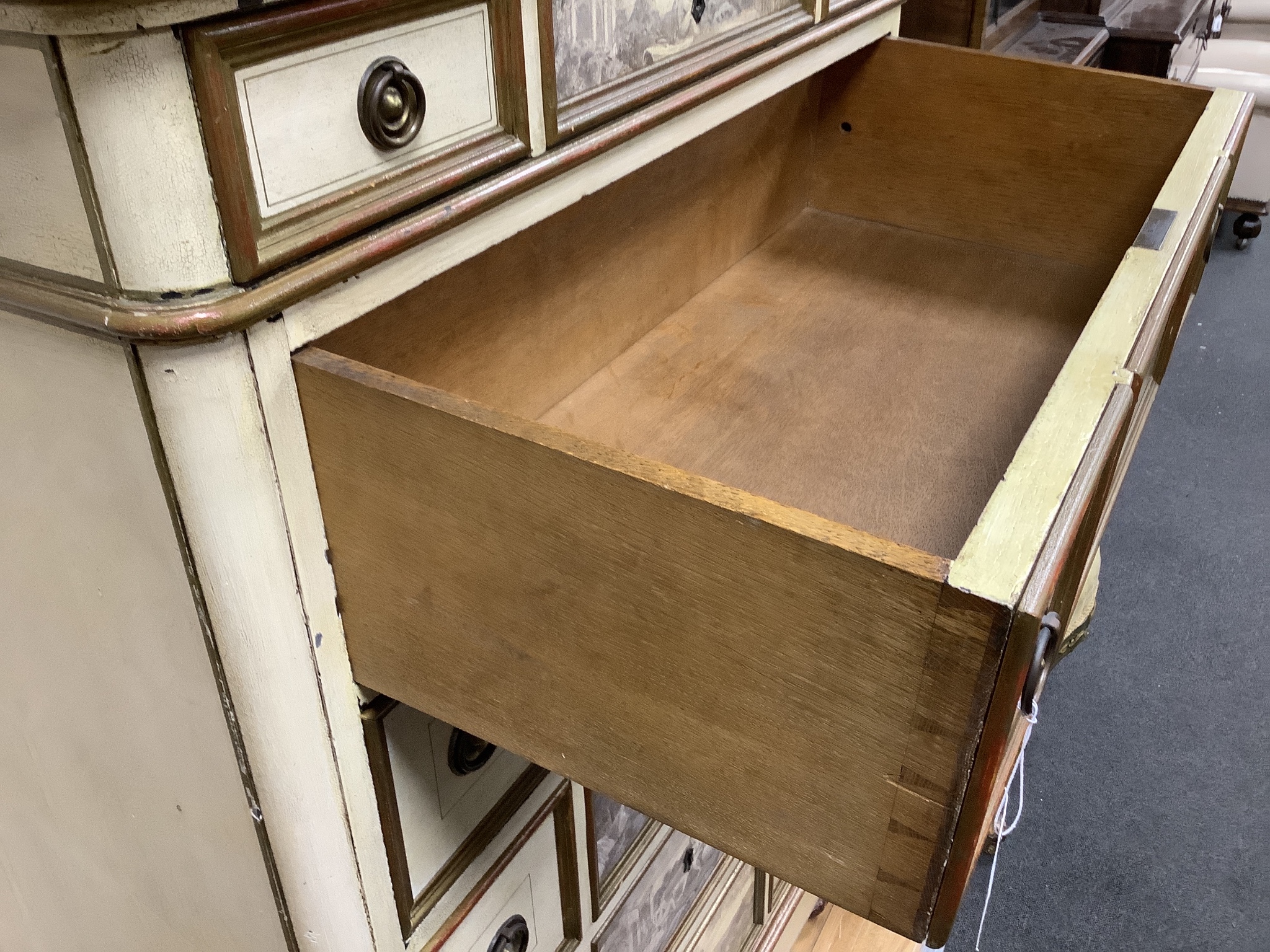 A mid 20th century Italian style painted six drawer chest decorated with cherub landscapes width 90cm, depth 45cm, height 140cm.